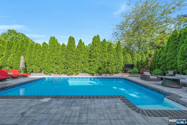 248 Camden St, Oradell, NJ 07649 - outdoor pool featuring a patio area