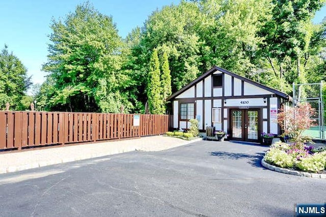 103 Mark Twain Way, Mahwah, NJ 07430 - tudor-style house featuring french doors