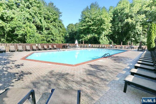 103 Mark Twain Way, Mahwah, NJ 07430 - community pool with a patio area