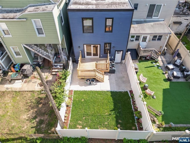 133 4th St, Bayonne, NJ 07002 - back of house featuring a patio area and a deck