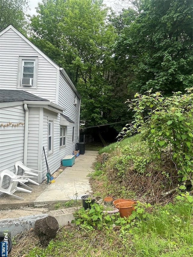 67-69 Garret St, Paterson, NJ 07501 - view of yard with a wooden deck and cooling unit