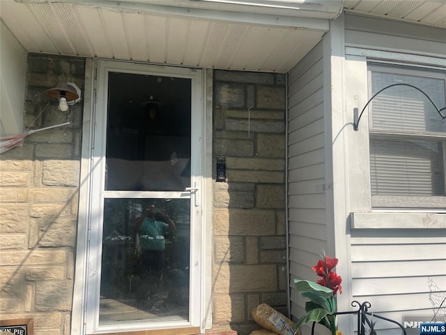 67-69 Garret St, Paterson, NJ 07501 - property entrance featuring stone siding