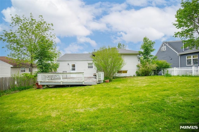 104 Richard St, Rockaway Township, NJ 07801 - back of property featuring a wooden deck