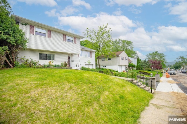 104 Richard St, Rockaway Township, NJ 07801 - tri-level home featuring a front lawn