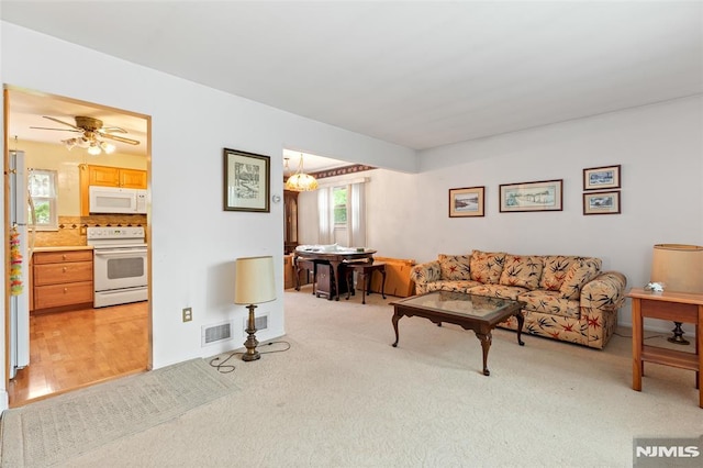 104 Richard St, Rockaway Township, NJ 07801 - living room with ceiling fan and light carpet