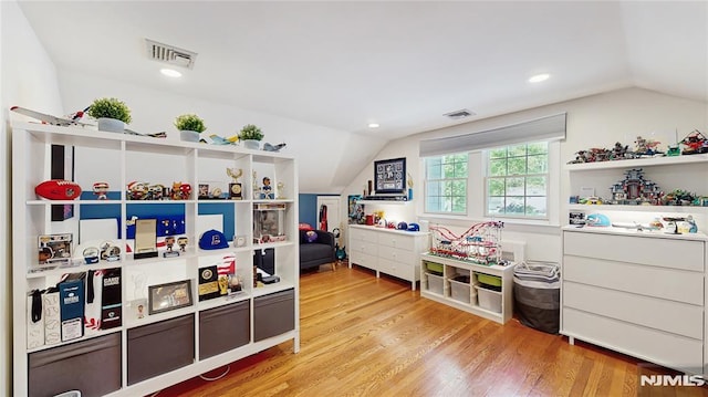 263 Standish Rd, Ridgewood, NJ 07450 - rec room featuring vaulted ceiling, light wood-style flooring, and recessed lighting