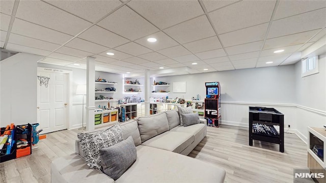 263 Standish Rd, Ridgewood, NJ 07450 - living room featuring light wood-type flooring, a wainscoted wall, a paneled ceiling, recessed lighting, and built in features