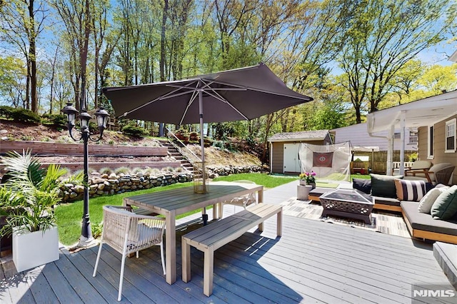 263 Standish Rd, Ridgewood, NJ 07450 - wooden deck with an outdoor living space with a fire pit and outdoor dining area