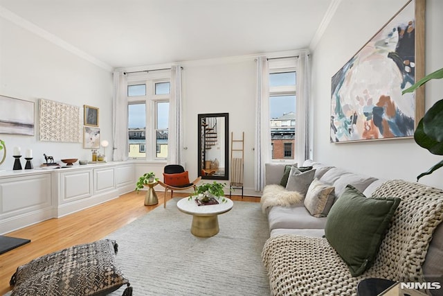 167 Wayne St Unit 407, Jersey City, NJ 07302 - living area featuring ornamental molding and light wood-style floors