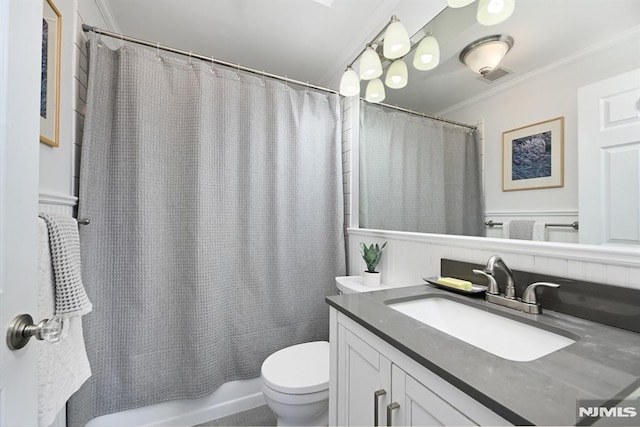 167 Wayne St Unit 407, Jersey City, NJ 07302 - bathroom with ornamental molding, toilet, vanity, and shower / bath combo with shower curtain