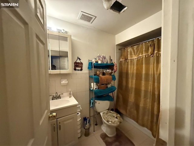 74 Kenmore Ave, Newark, NJ 07106 - bathroom with tile patterned flooring, vanity, toilet, and a shower with curtain
