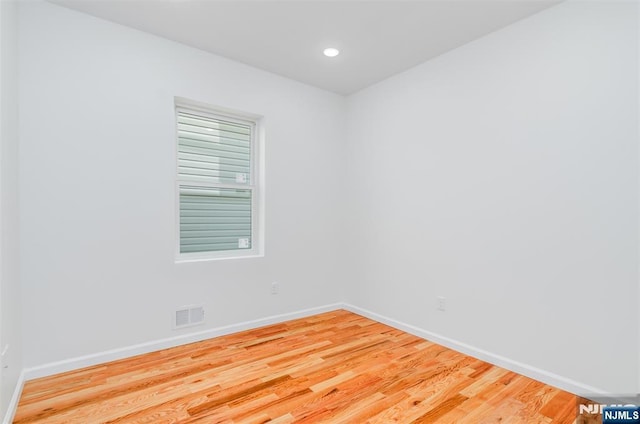 85 Myrtle Ave, Jersey City, NJ 07305 - spare room featuring baseboards, wood finished floors, and recessed lighting