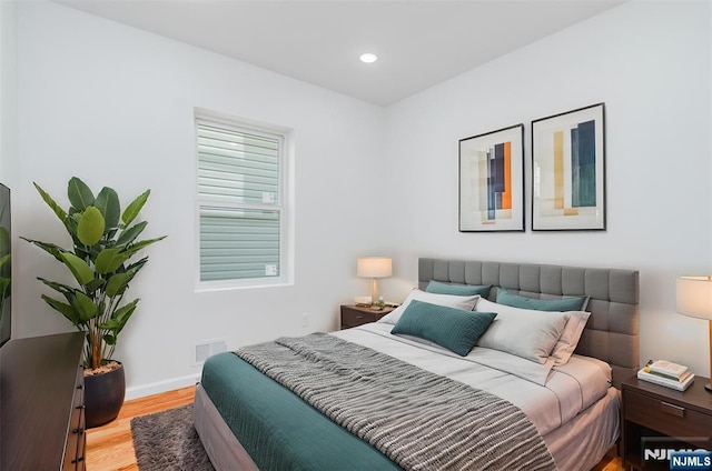 85 Myrtle Ave, Jersey City, NJ 07305 - bedroom featuring light wood-type flooring, recessed lighting, and baseboards