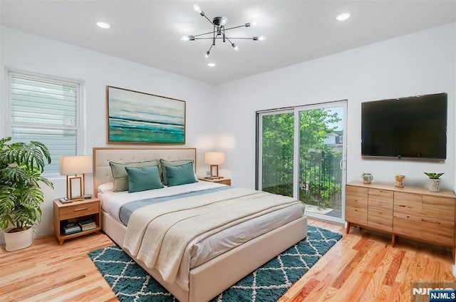 85 Myrtle Ave, Jersey City, NJ 07305 - bedroom with access to outside, light wood-type flooring, a chandelier, and recessed lighting