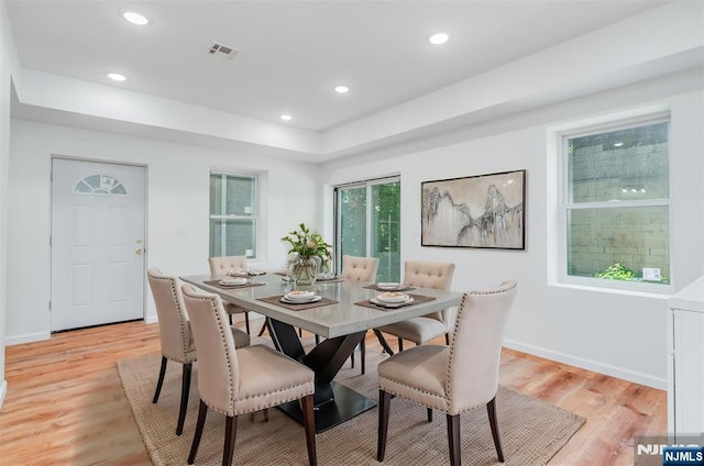 85 Myrtle Ave, Jersey City, NJ 07305 - dining room featuring light wood finished floors, recessed lighting, baseboards, and a tray ceiling