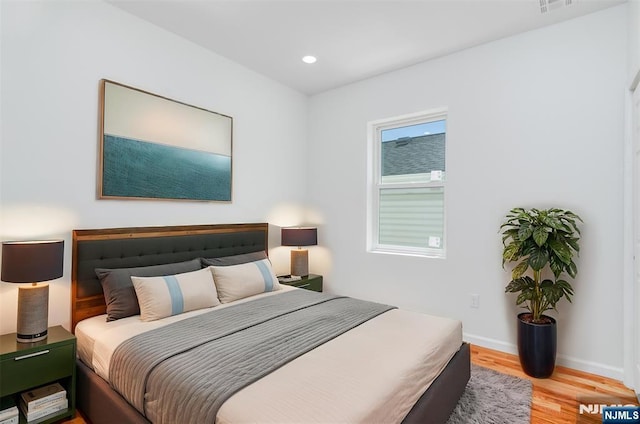 85 Myrtle Ave, Jersey City, NJ 07305 - bedroom featuring light wood-type flooring, recessed lighting, and baseboards