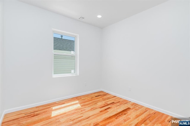 85 Myrtle Ave, Jersey City, NJ 07305 - spare room featuring baseboards, wood finished floors, and recessed lighting
