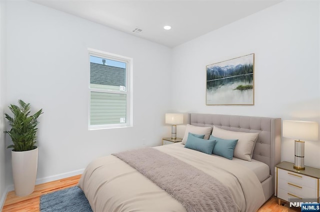 85 Myrtle Ave, Jersey City, NJ 07305 - bedroom featuring light wood-style flooring, baseboards, and recessed lighting