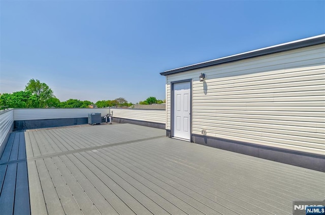 85 Myrtle Ave, Jersey City, NJ 07305 - wooden terrace featuring central AC unit