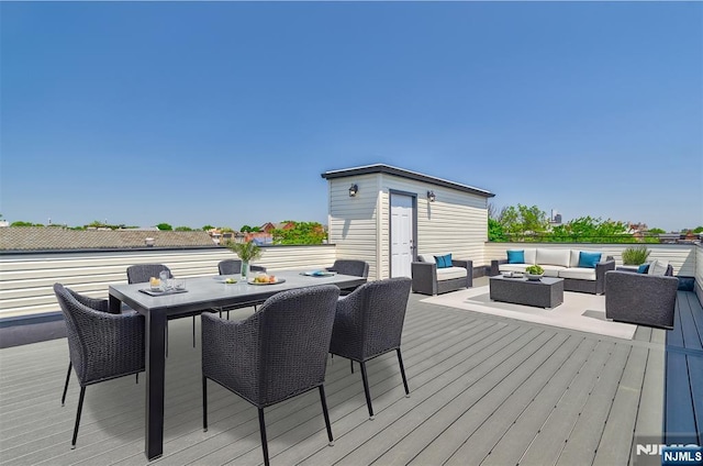 85 Myrtle Ave, Jersey City, NJ 07305 - wooden terrace with outdoor lounge area and outdoor dining area