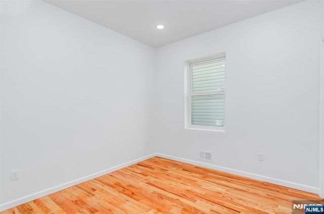 85 Myrtle Ave, Jersey City, NJ 07305 - empty room featuring baseboards, wood finished floors, and recessed lighting