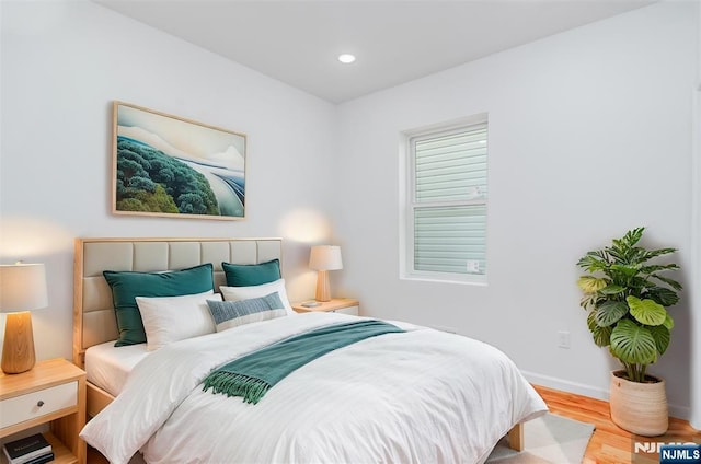 85 Myrtle Ave, Jersey City, NJ 07305 - bedroom featuring wood finished floors, baseboards, and recessed lighting