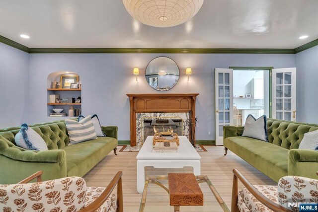 76 Wildwood Rd, Ridgewood, NJ 07450 - living area featuring a fireplace, ornamental molding, and baseboards
