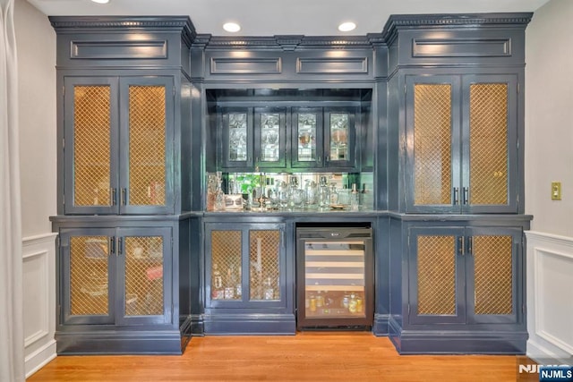 76 Wildwood Rd, Ridgewood, NJ 07450 - indoor bar featuring beverage cooler, a decorative wall, recessed lighting, and wood finished floors