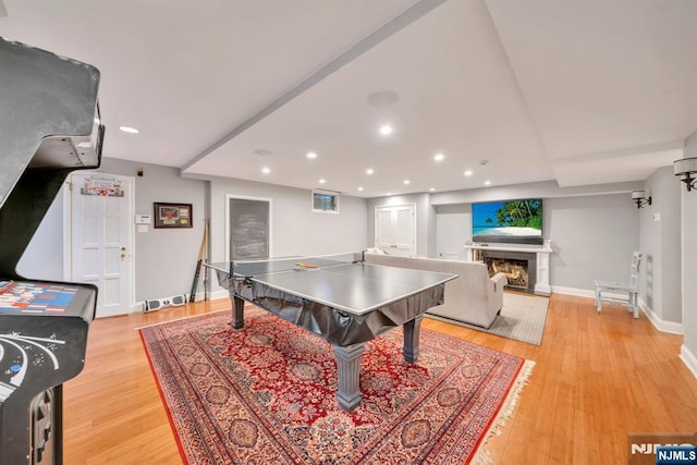 76 Wildwood Rd, Ridgewood, NJ 07450 - rec room featuring light wood-type flooring, baseboards, a fireplace, and recessed lighting