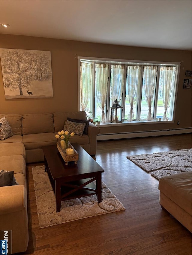 32 Northgate, Wanaque, NJ 07465 - living area featuring plenty of natural light and wood finished floors