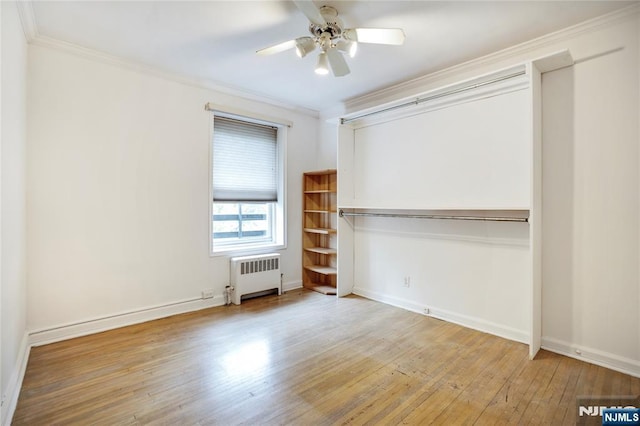 2350 Linwood Ave Unit 4D, Fort Lee, NJ 07024 - unfurnished bedroom with radiator, wood finished floors, crown molding, baseboards, and ceiling fan