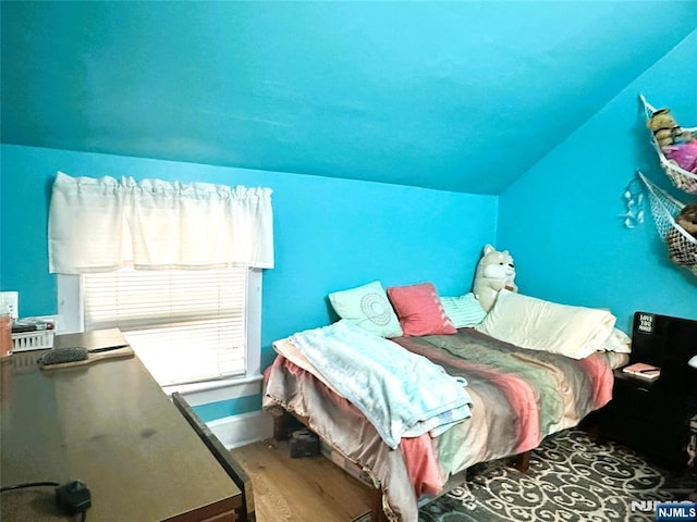 84 Haring St, Bergenfield, NJ 07621 - bedroom with wood finished floors and lofted ceiling