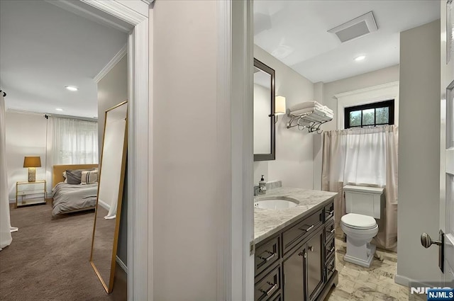 246 Park Ave, Allendale, NJ 07401 - ensuite bathroom featuring vanity, toilet, crown molding, and recessed lighting