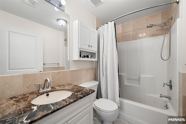 270 Grand Ave Unit 4E, Palisades Park, NJ 07650 - full bathroom with vanity, shower / bath combo with shower curtain, backsplash, and toilet