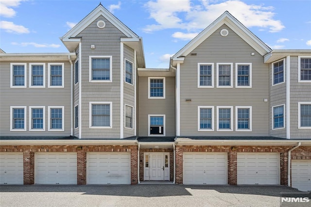 270 Grand Ave Unit 4E, Palisades Park, NJ 07650 - townhome / multi-family property featuring a garage and brick siding