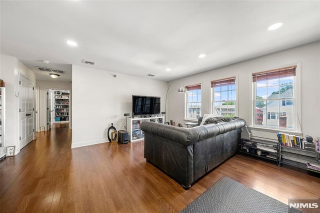 270 Grand Ave Unit 4E, Palisades Park, NJ 07650 - living area featuring wood finished floors, plenty of natural light, recessed lighting, and baseboards