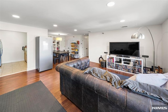 270 Grand Ave Unit 4E, Palisades Park, NJ 07650 - living area with wood finished floors, recessed lighting, and baseboards