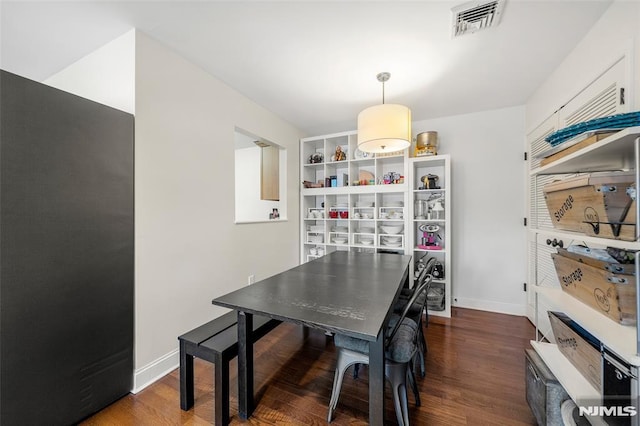270 Grand Ave Unit 4E, Palisades Park, NJ 07650 - dining space with wood finished floors and baseboards