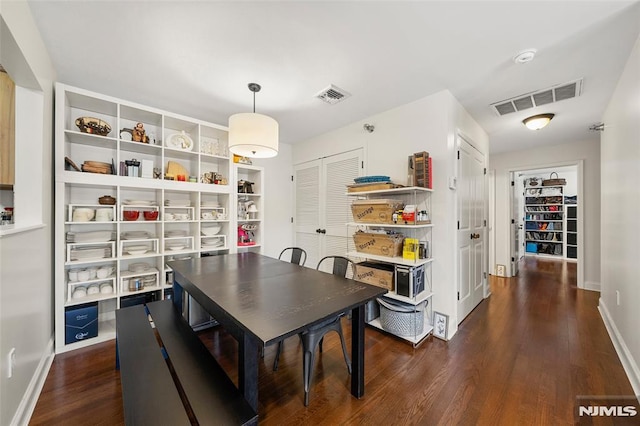 270 Grand Ave Unit 4E, Palisades Park, NJ 07650 - dining space with dark wood-type flooring and baseboards