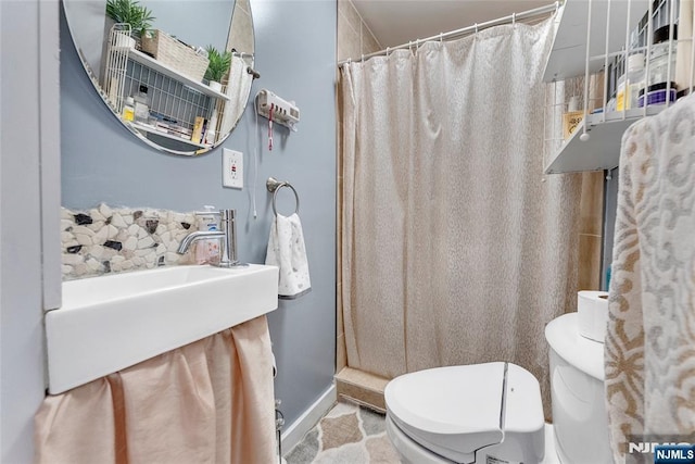 18 Tromp St, Clifton, NJ 07011 - bathroom with toilet, a shower with shower curtain, and a sink