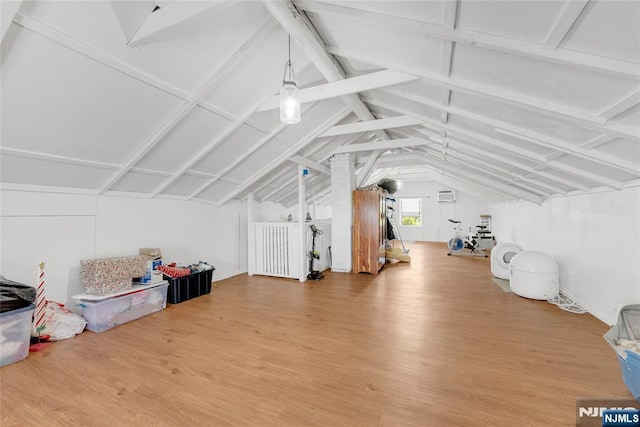 18 Tromp St, Clifton, NJ 07011 - bonus room with vaulted ceiling, wood finished floors, and a wall mounted AC