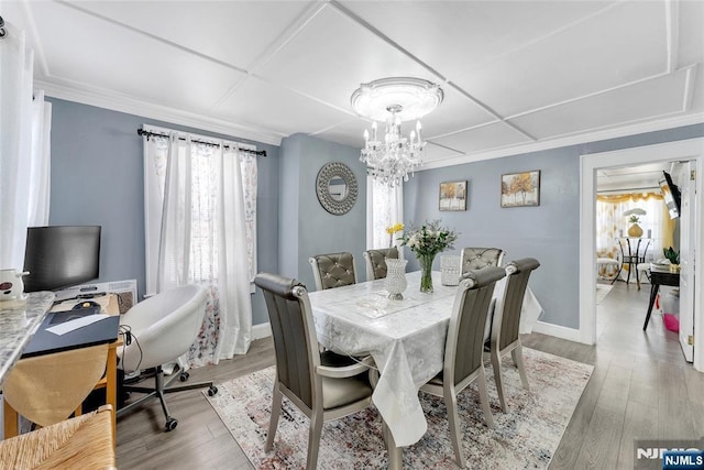 18 Tromp St, Clifton, NJ 07011 - dining space with a chandelier, crown molding, baseboards, and wood finished floors