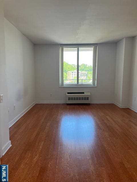 615 Hudson Park, Edgewater, NJ 07020 - spare room with wood finished floors and baseboards