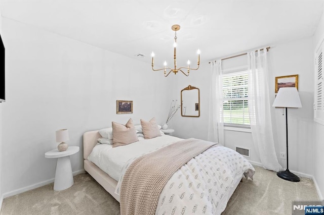 544 Jackson Ave, Twp Of Washington, NJ 07676 - carpeted bedroom featuring a chandelier and baseboards