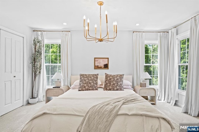 544 Jackson Ave, Twp Of Washington, NJ 07676 - carpeted bedroom with a chandelier and recessed lighting