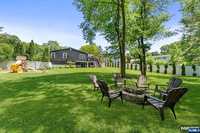 544 Jackson Ave, Twp Of Washington, NJ 07676 - view of yard with a fire pit, a playground, stairway, and a wooden deck