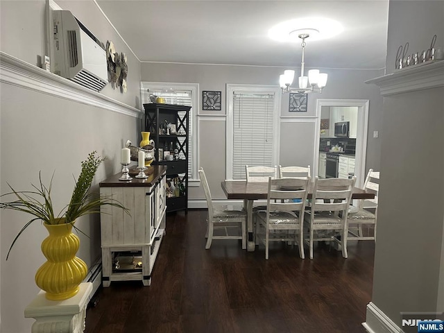 140 Oak St, Paterson, NJ 07501 - dining space with a chandelier and wood finished floors