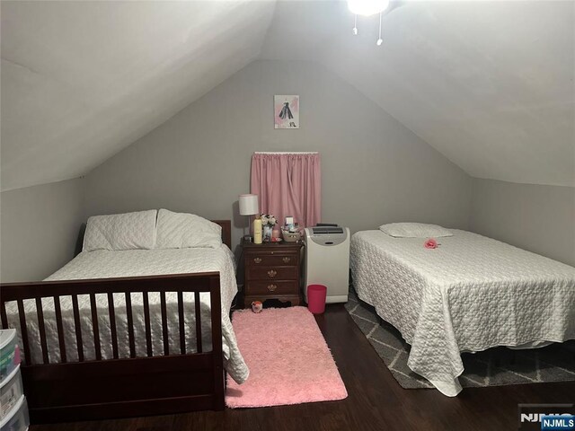 140 Oak St, Paterson, NJ 07501 - bedroom featuring lofted ceiling and wood finished floors