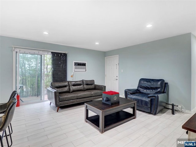2200 Paterson Plank Rd Unit 19, North Bergen, NJ 07047 - living area with a wall mounted air conditioner, recessed lighting, and baseboard heating