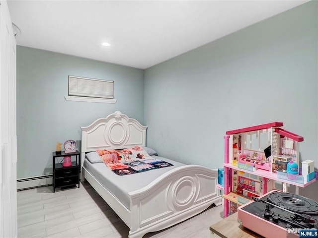 2200 Paterson Plank Rd Unit 19, North Bergen, NJ 07047 - bedroom with baseboard heating and recessed lighting
